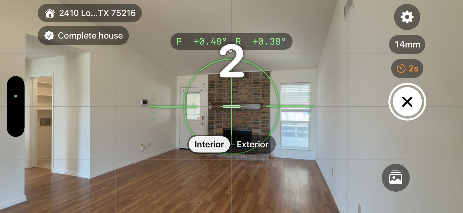FramePerfect camera interface showing leveling guidance over a room